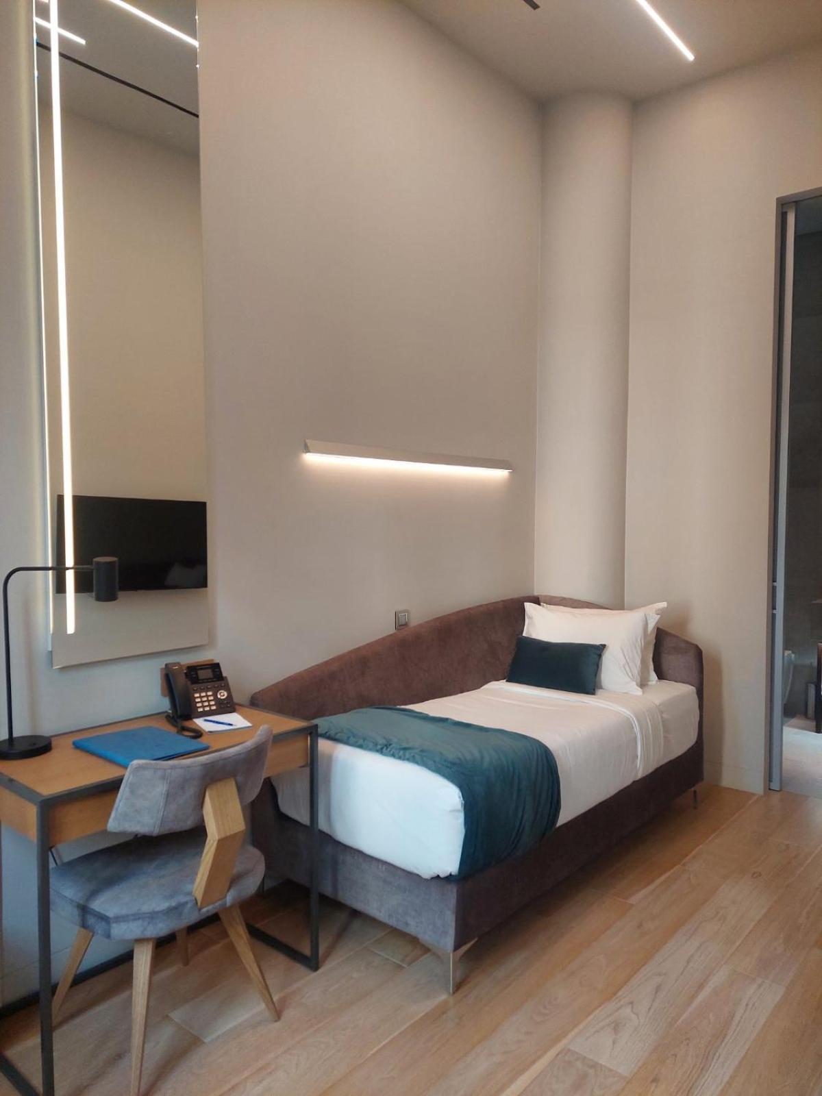 Hellenic Vibes Smart Hotel Athen Værelse billede A room at the hotel